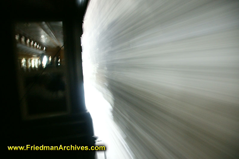 transportation,train,tunnel,time lapse,handheld,dark,