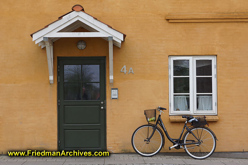 wall,study,bicycle,window,scene,apartment,house,door,yellow,orange,still life,