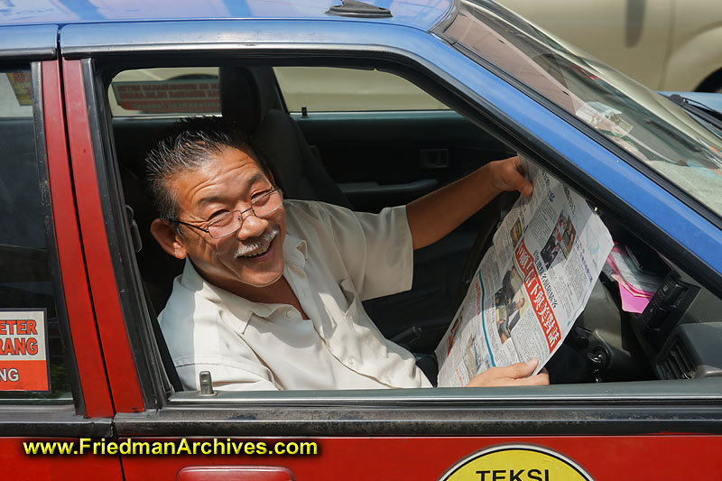 malaysia,kuala lumpur,taxi,driver,newspaper,friendly,old,man,living,jobs,