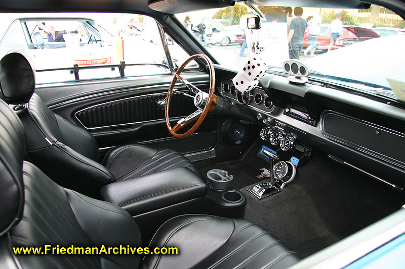 The interior of a classic 1960'sera Ford Mustang