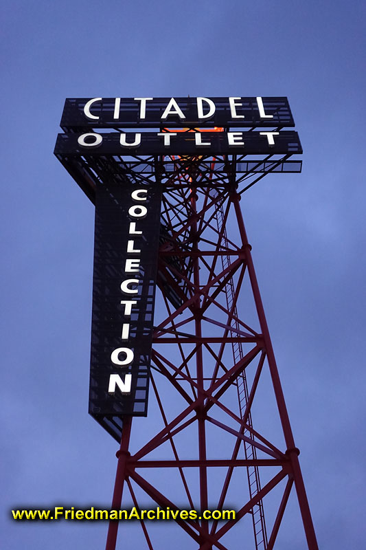 shopping,commerce,fashion,mall,outlets,neon,blue,sky,sign,tourist,uniroyal,marker,