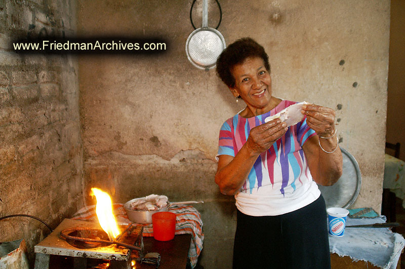 Shy Aunt cooking fish 300 dpi PICT3475