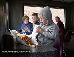 Kid eating Cheese Fries PICT0524
