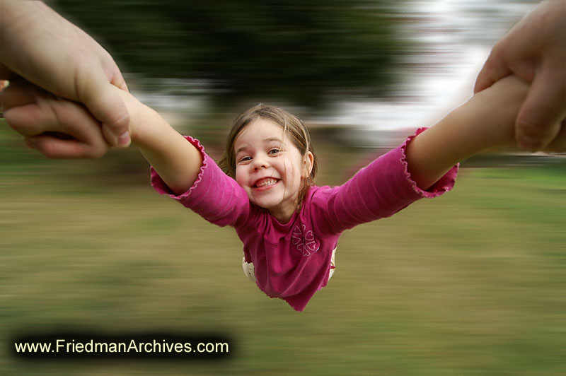 Girl Spinning in Air