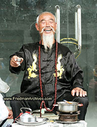 Happy man drinking tea