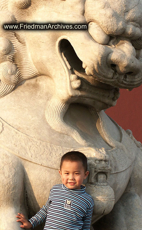 Boy and statue