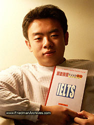 Michael holding IELTS book