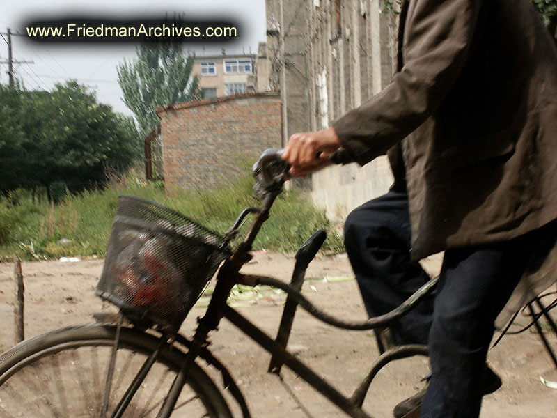 Headless man on bike 6x8 300 dpi