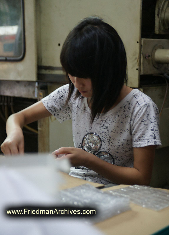 Factory Worker girl assembling labor