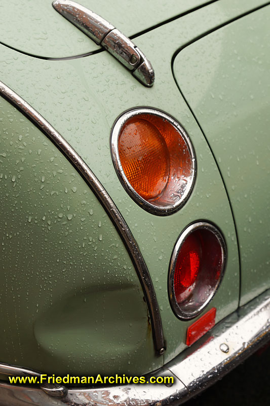 copenhagen,denmark,car,tail light,fender,bumper,close-up,green,red,