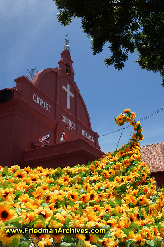 Christian,church,yellow,flowers,red,tourist,portugal,portugeese,attraction,Malaysia,