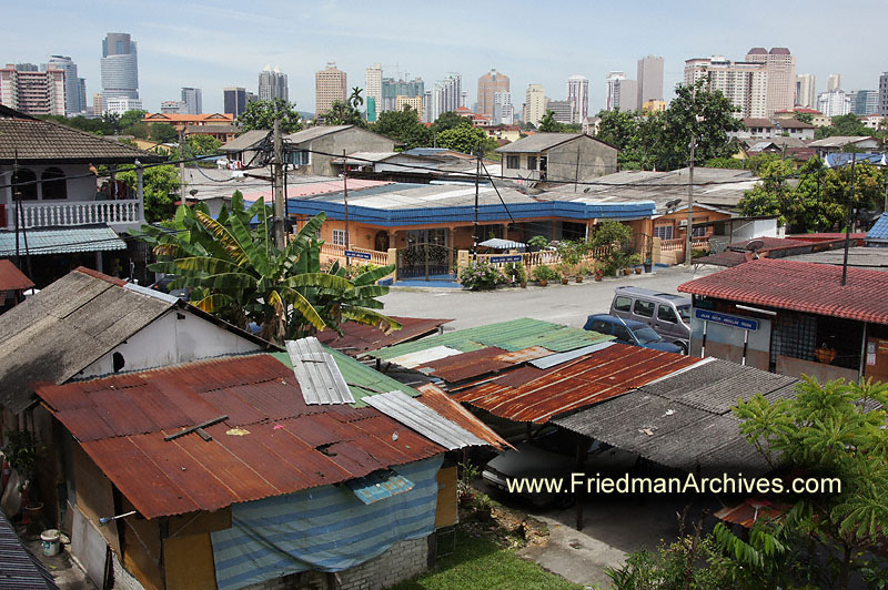 sheds,rooftops,poor,rich,contrast,city,skyline,