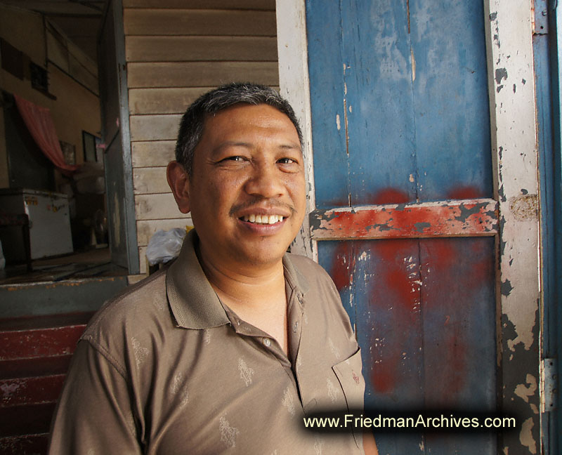 malasian,resident,blue,door,house,poor,happy,poverty,