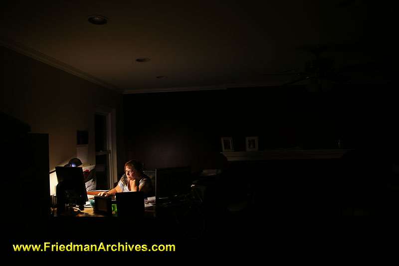 labor,vacation,holiday,midnight oil,working late,dark,room,black,desk,lamp,
