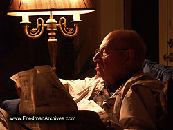 man reading newspaper