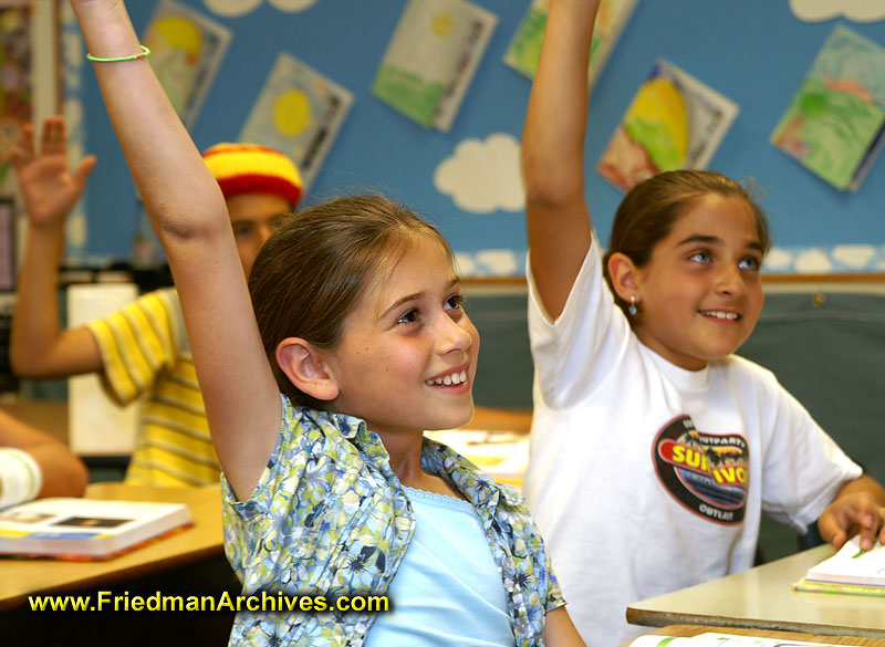 2 Girls Raising Hands