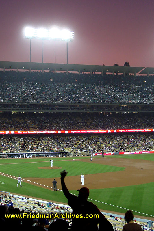 baseball,sports,spectators,ball game, ballgame,food,peanuts,popcorn,crackerjacks,silhouette,red,sky,sunset,stadium,pasttime,