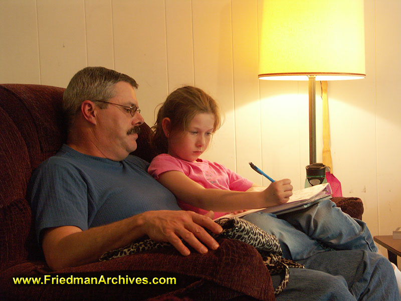 Father and Daughter Studying