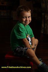 Mikah Green Shirt Red Stool portrait lighting DSC00140