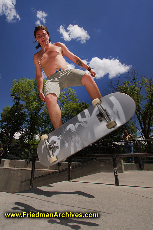 ipod,airborne,skateboard,skateboarder,dude,awesome,sky,blue,