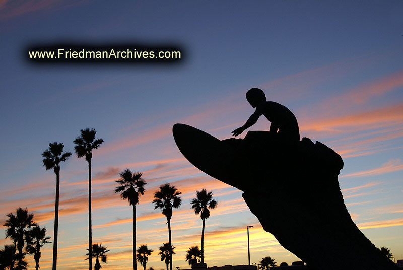 Surfer Statue and Sunset