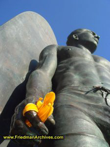 Duke statue with flower in hand