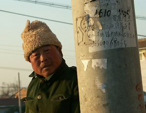 Man and pole.