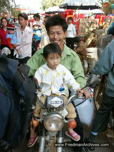 Father and Daughter on Motorcycle