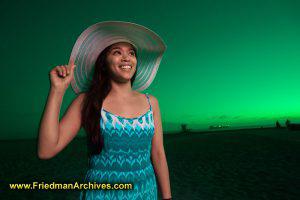 Girl with hat and Green Sky