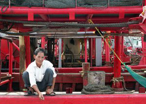 Smoking break on a fishing vessel.