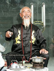 Happy man drinking tea