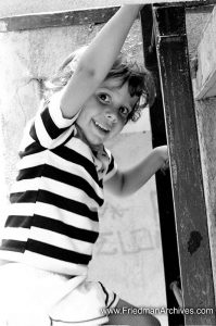 Kid on Ladder in Park