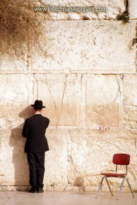 Man Standing at Wall