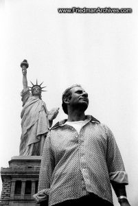 Miscellaneous Images Man at Statue of Liberty