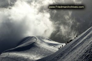 Mountain Climbers Silhouetted