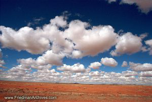 Blue Sky and Puffy Clouds