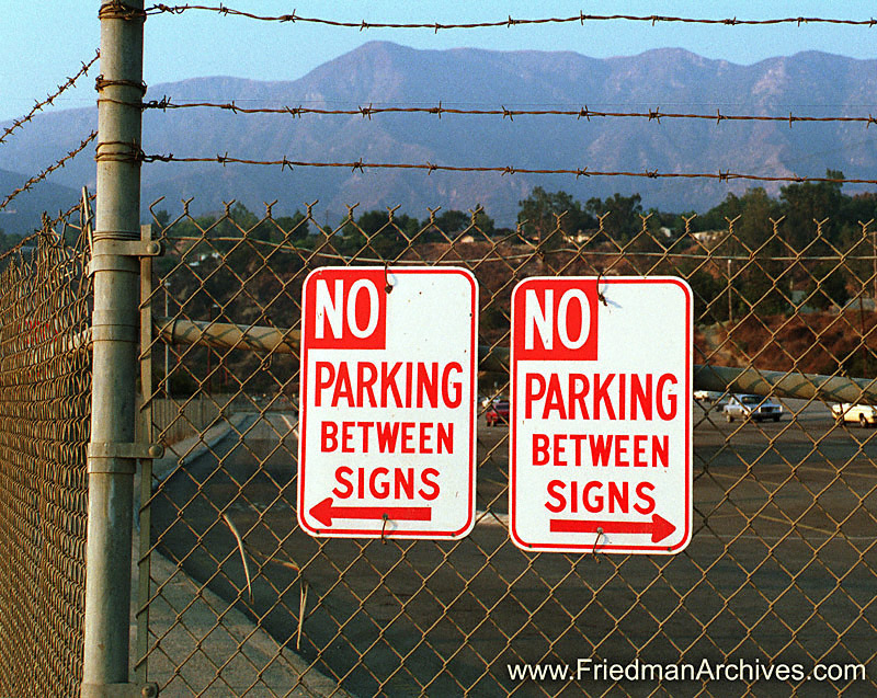 No Parking Between Signs